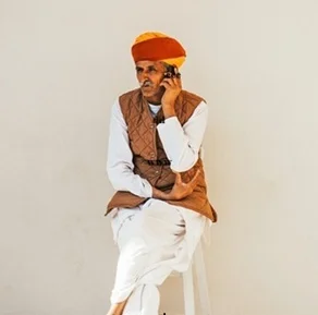 Man-sitting-on-floor-80087